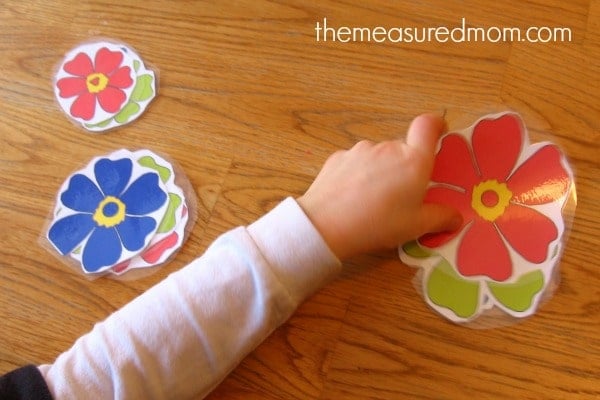 child sorting flower cards