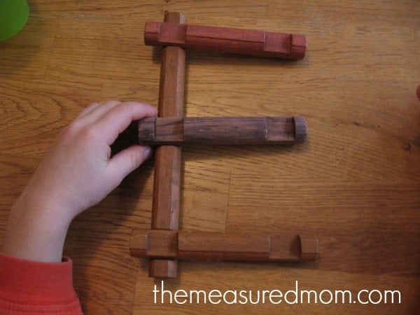 letter E with Lincoln Logs