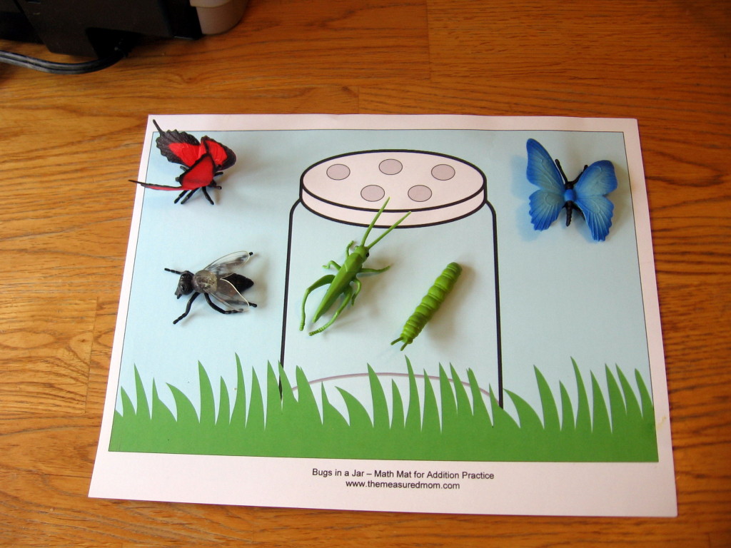 toy bugs on clip art jar