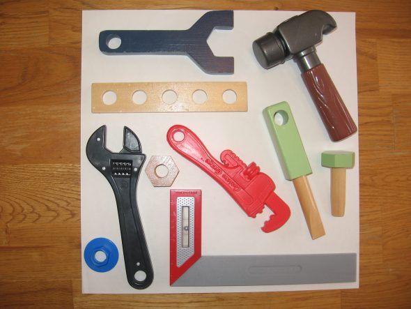 toy tools on paper
