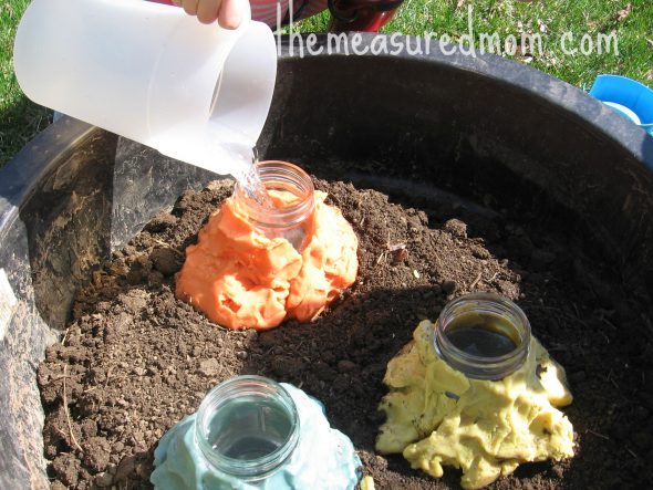 pouring warm water into jar
