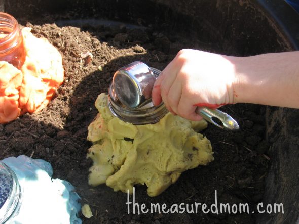 dumping baking soda into jar 