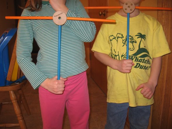 children with Tinker Toys letter T's