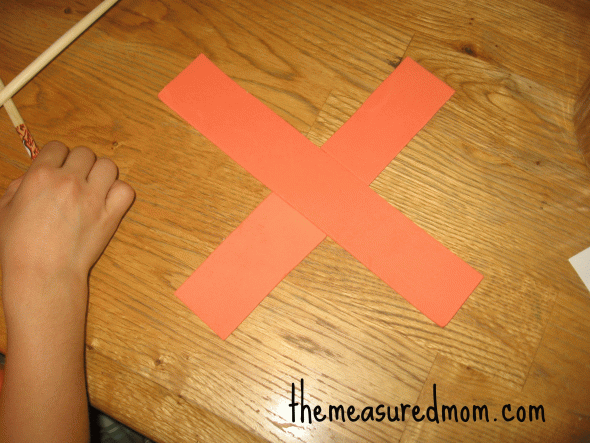 child with letter X with foam 