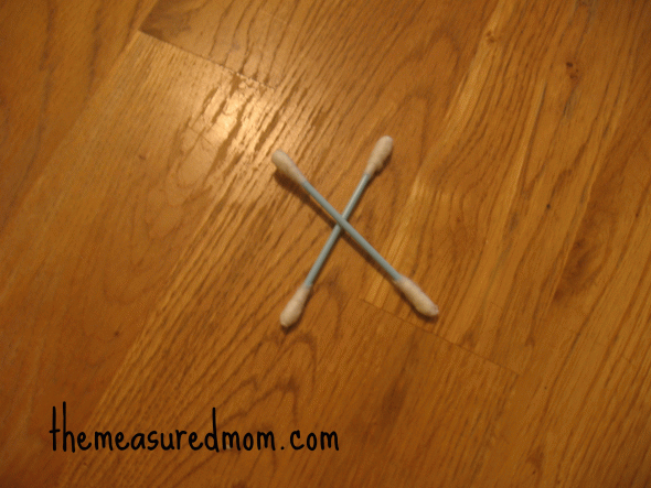 letter X with Q-tips