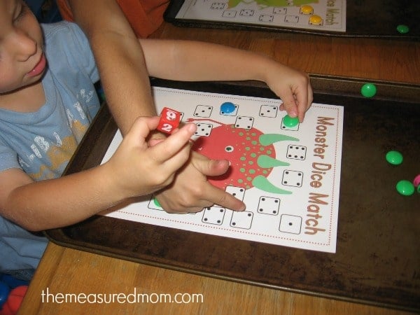 Looking for a preschool math game? We love this monster dice game. Get four free game boards! 