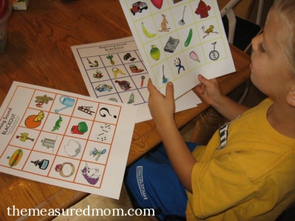 Looking for a free printable for teaching beginning sounds? My preschooler often asks to play this initial sound activity!