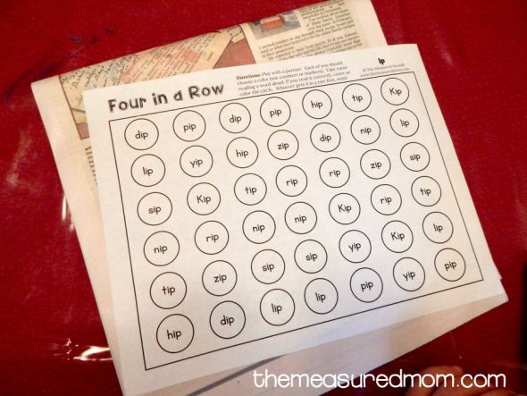 Get our free four-in-a-row games for reading short i words!