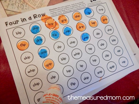 Get our free four-in-a-row games for reading short i words!