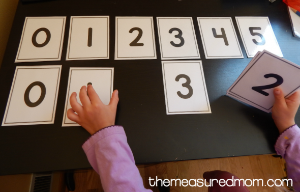 Here are five ways to use number cards with your preschooler. Get free printable cards, too! 