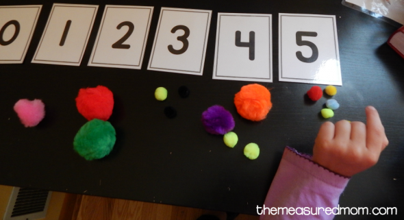 Here are five ways to use number cards with your preschooler. Get free printable cards, too! 