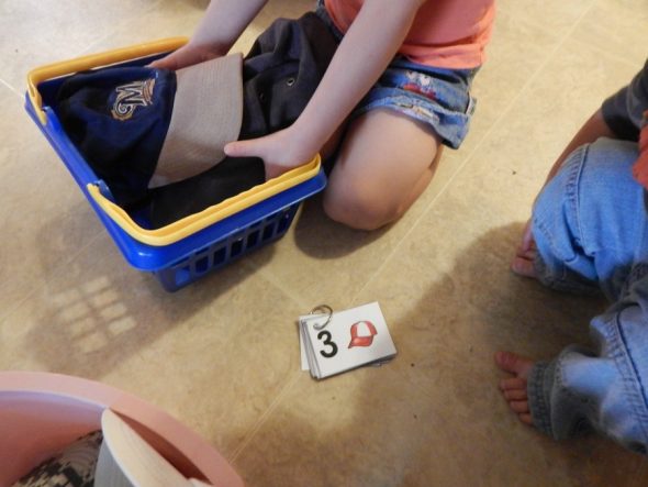 child using number cards