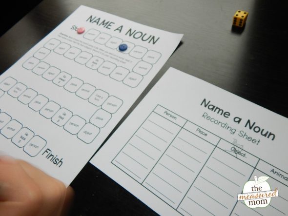 child playing a printable noun game