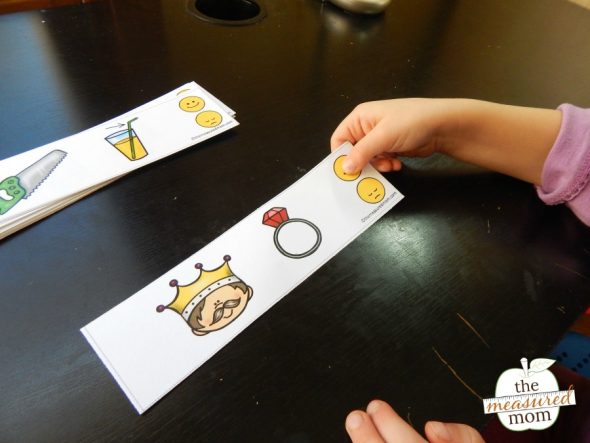 Child practicing rhyming with printable